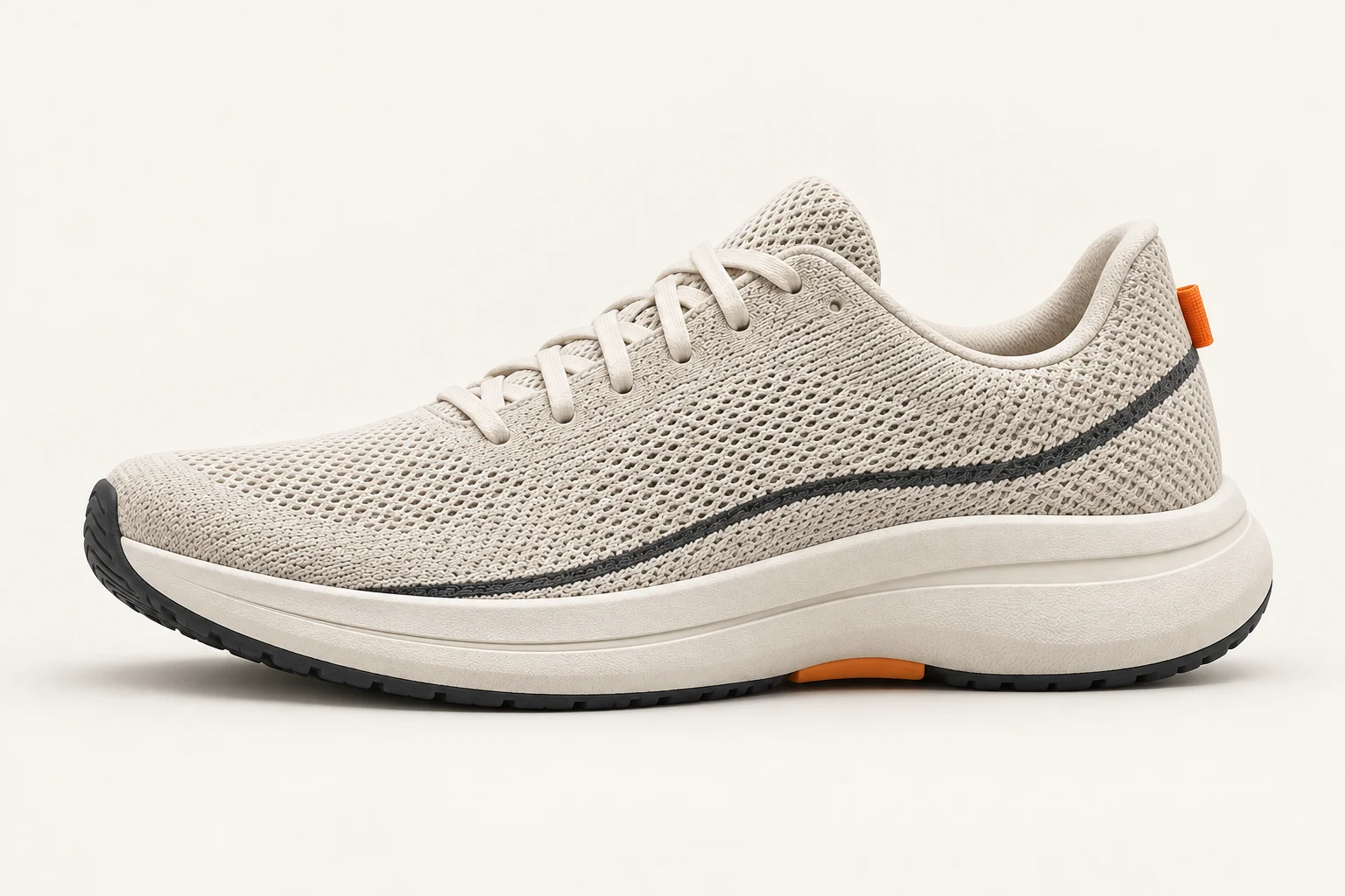 Runner 01 in side profile: chalk mesh, charcoal seam and orange heel tab