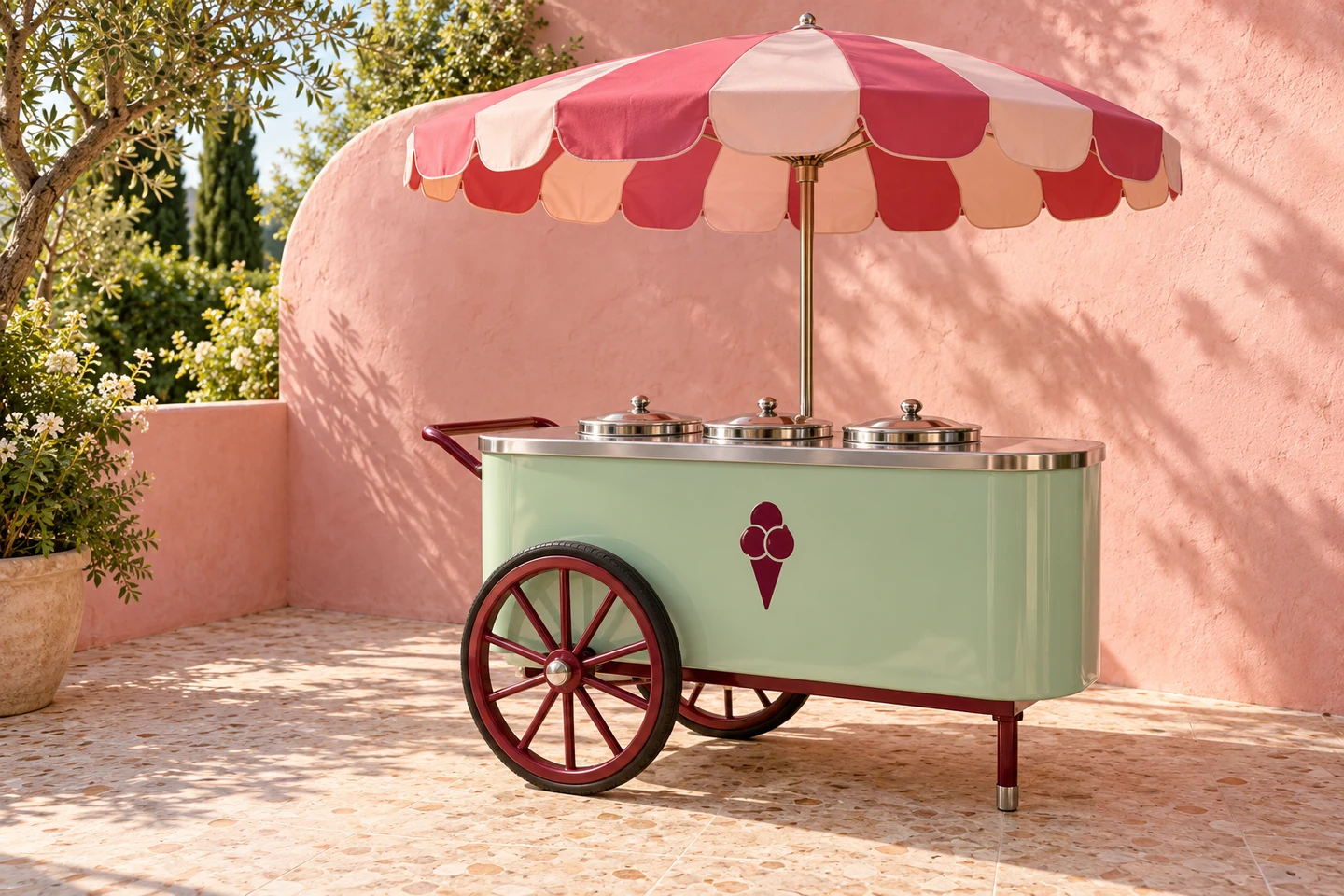 Original concept image of a mint ice-cream cart with a pink scalloped parasol in a sunlit courtyard.